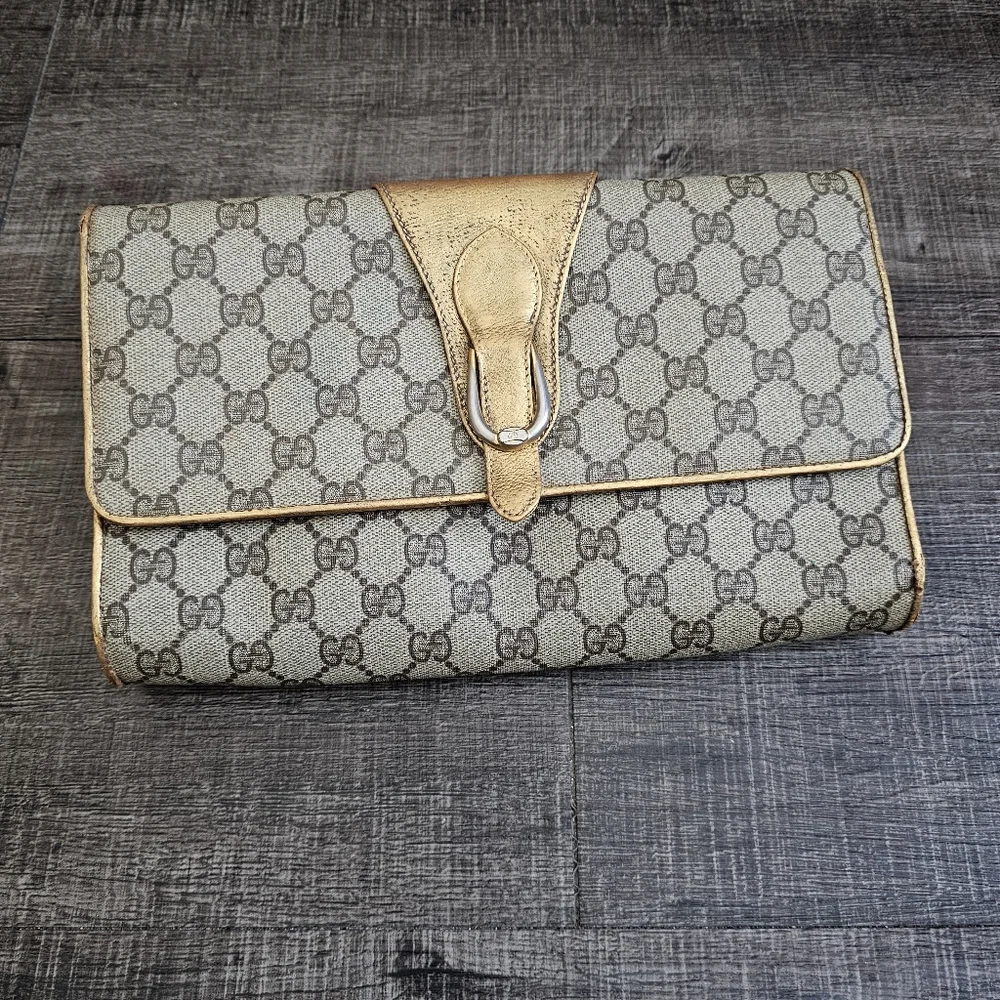 Gucci - Monogram Clutch